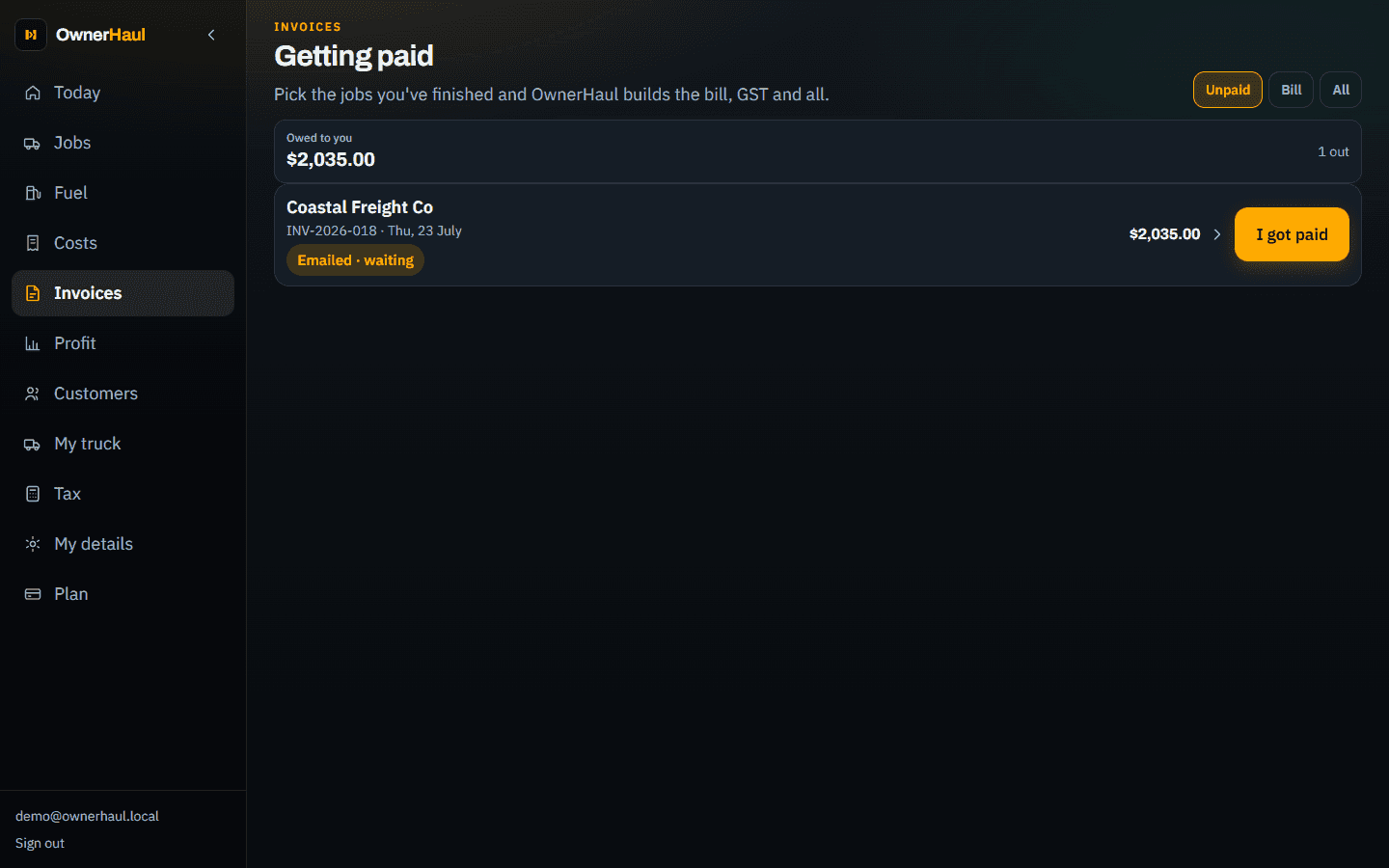 OwnerHaul Invoices screen showing unpaid invoices and mark-as-paid actions